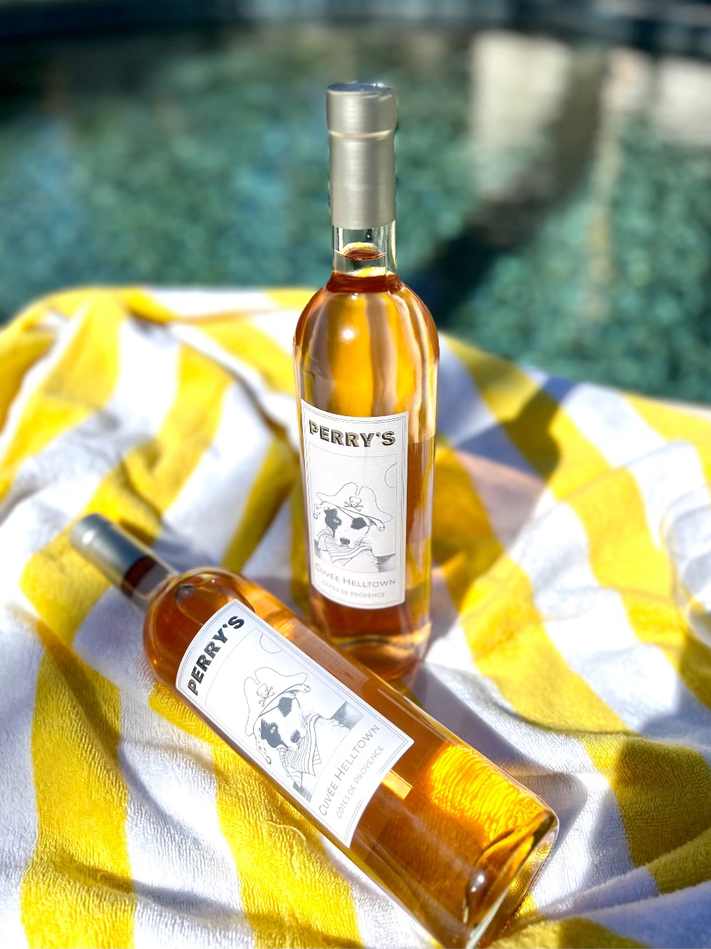 Two bottles of Perry's Rose Wine by the pool in Palm Springs
